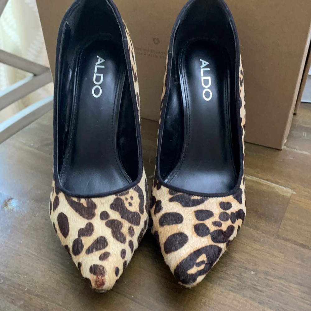 Aldo leopard platform pumps 4.1/2 inches with 1/2 in platform. Never worn.